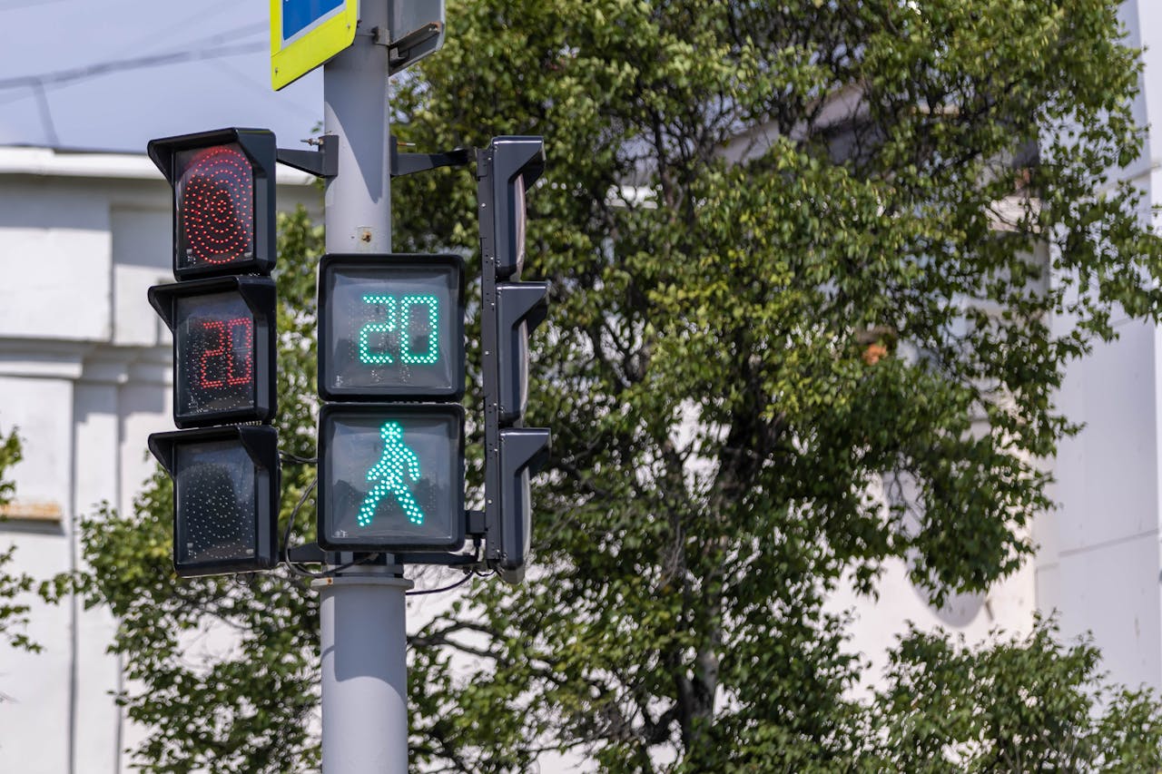 The Art of Drawing Readers In: Your attractive post title goes here Traffic light with pedestrian countdown timer in a city setting.